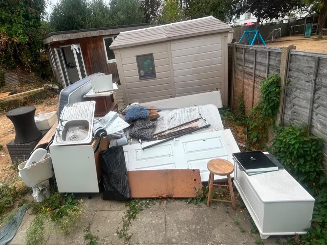 Garden and shed area before ScapeClear removed the unwanted items