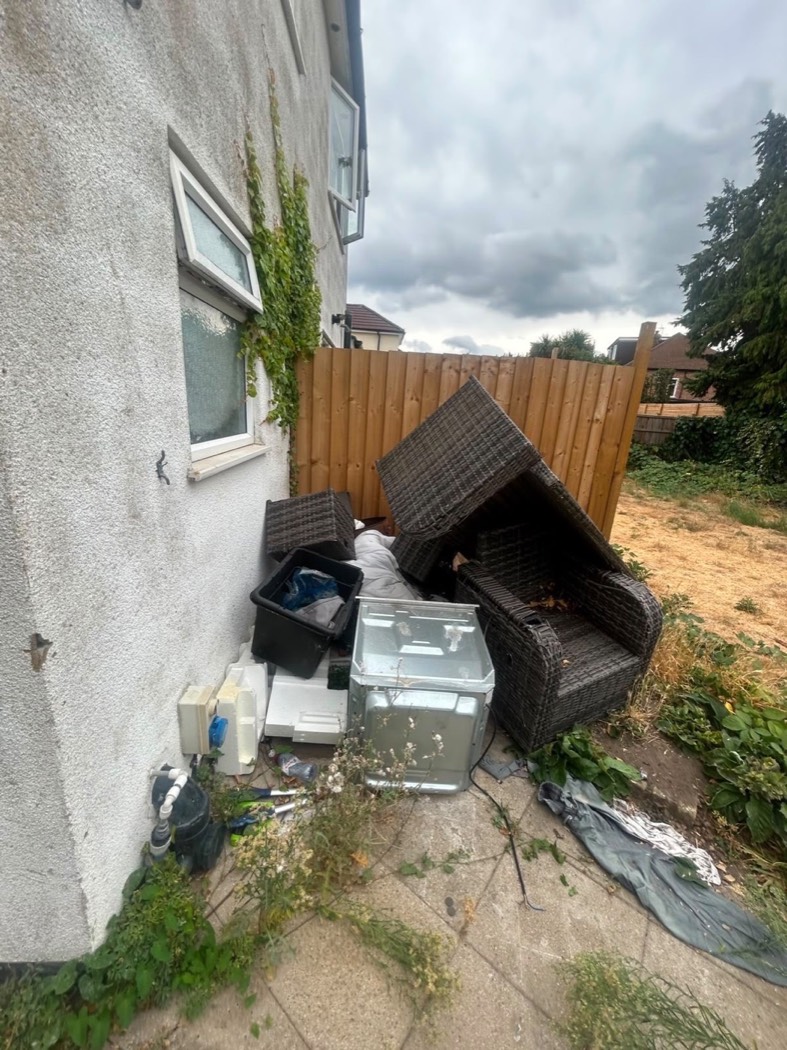 Side passage before ScapeClear removed furniture and unwanted items